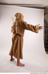 JOEL_ADAMSON STANDING POSE WITH A MAGIC STICK